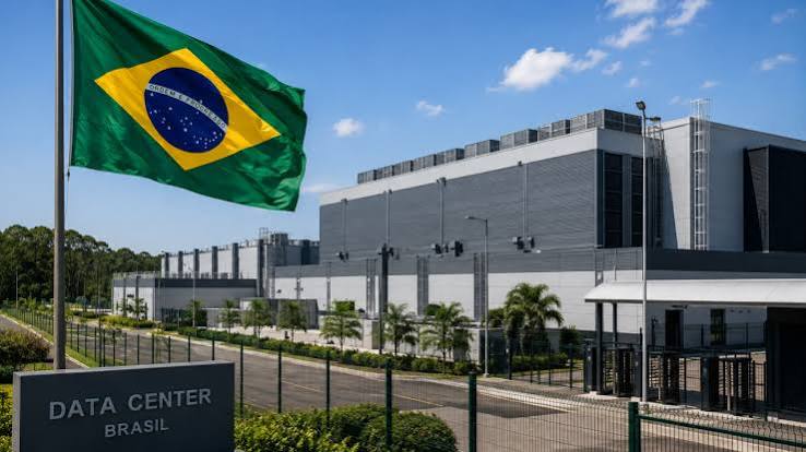 The Brazilian flag over two server-rack silhouettes, one tinted red and one grey, representing a national AI build split between Chinese and US hardware