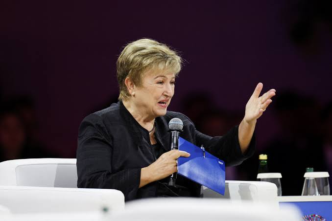 IMF Managing Director Kristalina Georgieva speaking on stage with a microphone during an IMF session