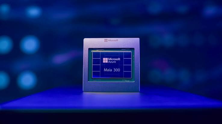 Microsoft Azure Maia 300 AI inference chip displayed on a lit stand against a dark blue background