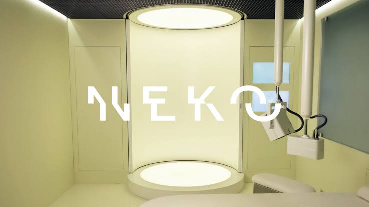 Neko Health full-body scan pod in a minimalist clinic, illustrating AI-read preventive health screening
