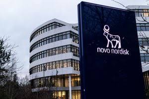 Novo Nordisk headquarters building with the company logo sign in the foreground