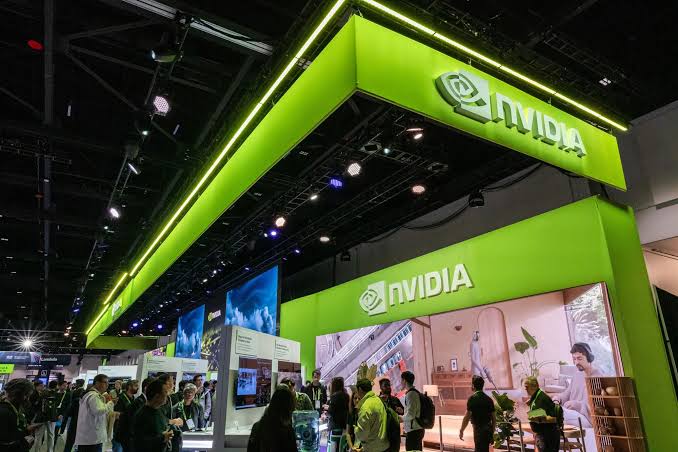 The Nvidia and Poolside logos linked by a licensing contract rather than a merger arrow, on a dark background, representing a deal structured to avoid acquisition review