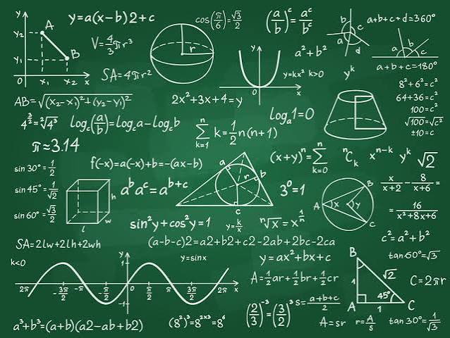 Chalkboard covered in handwritten math formulas, geometry diagrams and trigonometric graphs