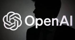 The OpenAI logo and wordmark with a person silhouetted behind it