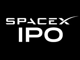 SpaceX Starship launch vehicle against a dark sky, representing the company's Nasdaq debut