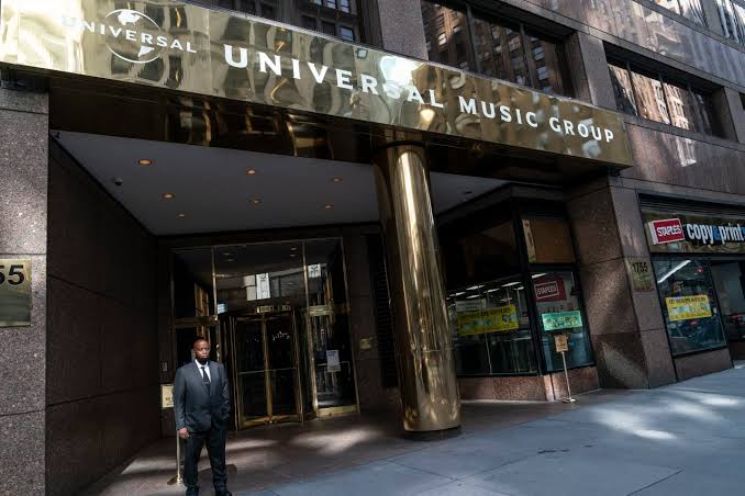 The Universal Music Group building entrance in New York, its gold Universal Music Group signage above the doors